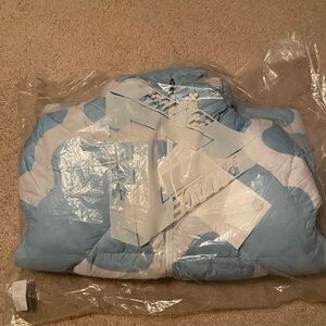 Palace x Oakley puffer “Cloud”